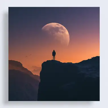 A lone traveller silhouetted against a rising moon